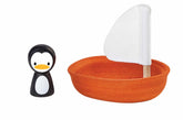 Jucărie de baie cu 1 bărcuță plutitoare și 1 figurină pinguin, Plan Toys